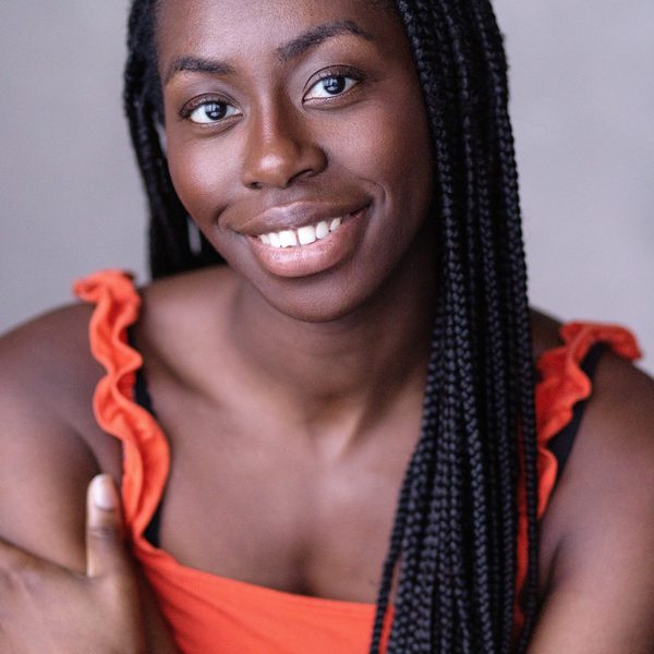 Merryl Ansah smiles to camera.