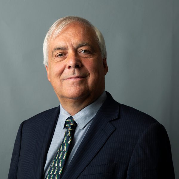 Portrait of Michael Dussek smiling to camera.