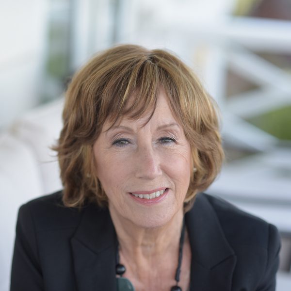 Norma Winstone smiles to camera.