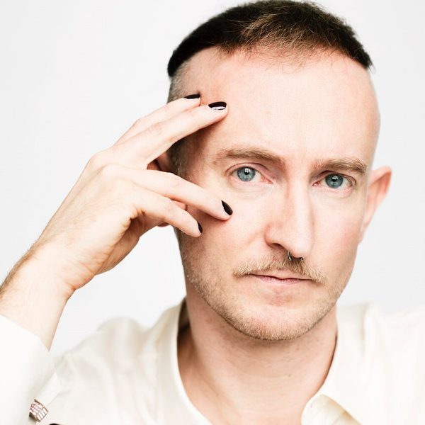 Headshot of composer Philip Venables, looking to camera.