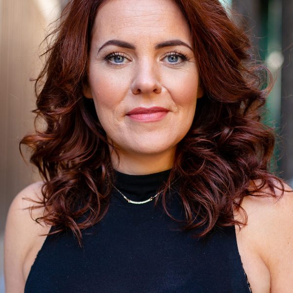 Rachel Tucker smiles to camera.