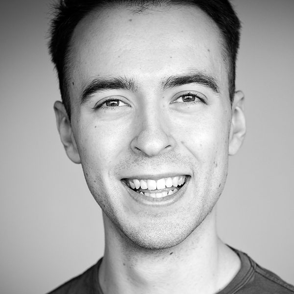 Portrait of Robert Madge smiling.