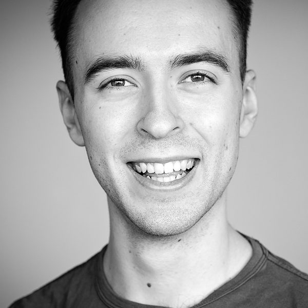 Portrait of Robert Madge smiling.