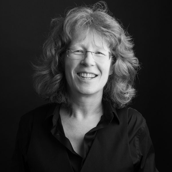 Portrait of Sian Edwards smiling for camera.
