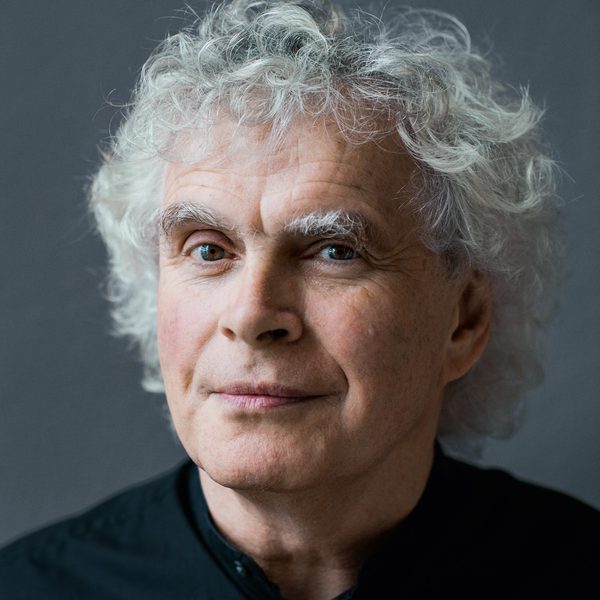 Head shot of conductor Sir Simon Rattle.
