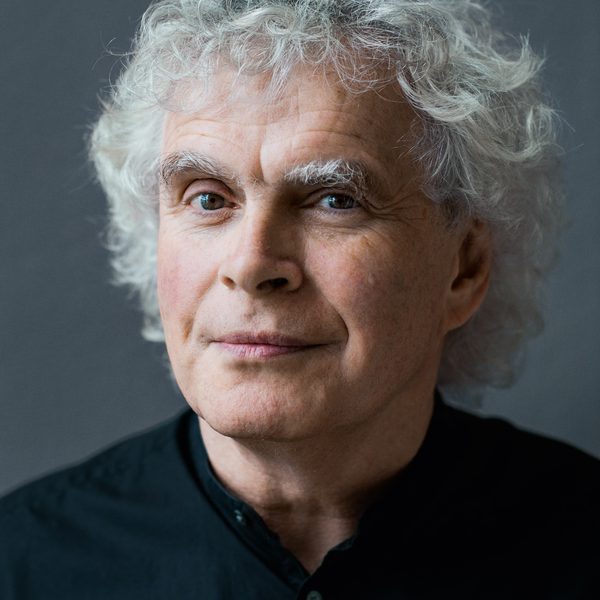 Head shot of conductor Sir Simon Rattle.