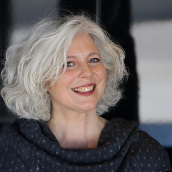 Sophie Daneman smiles to camera.