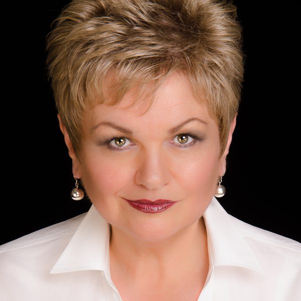 Susan Bullock looks to camera.