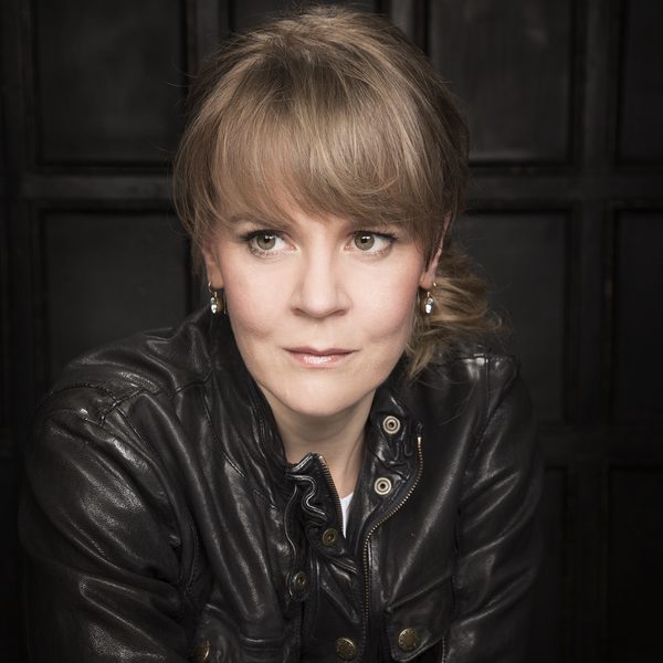 Susanna Malkki poses for camera, crossing arms.