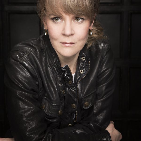 Susanna Malkki poses for camera, crossing arms.