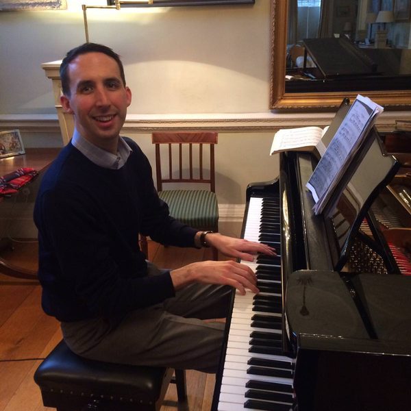 Timothy End plays a piano.