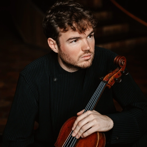 Portrait of Timothy Ridout, holding a viola
