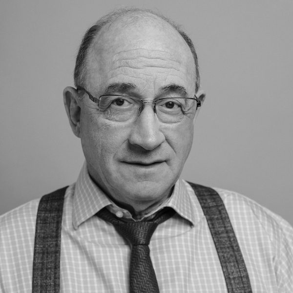 Todd Susman headshot from above shoulders.
