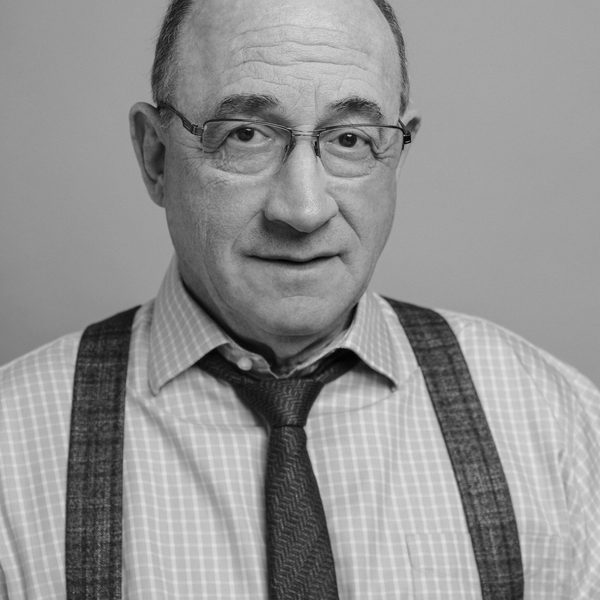 Todd Susman headshot from above shoulders.