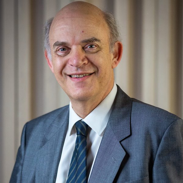 Portrait of Michael Lewin smiling for camera